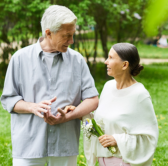 senior couple holding flowers understanding retirement strategies oregon